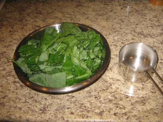 chopped collards, one- cup measure on right for scale