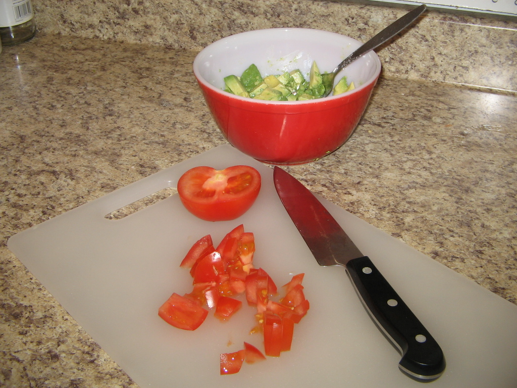 Next, 1/2 a tomato, chopped
